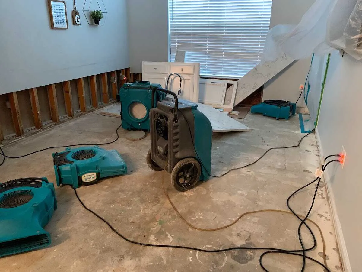 Dehumidifier in flood-cut room for Water Damage Restoration in Marlborough